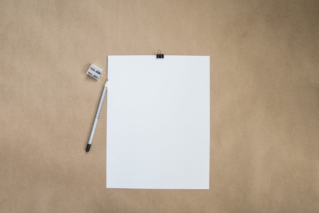 decorative image: paper and pencil