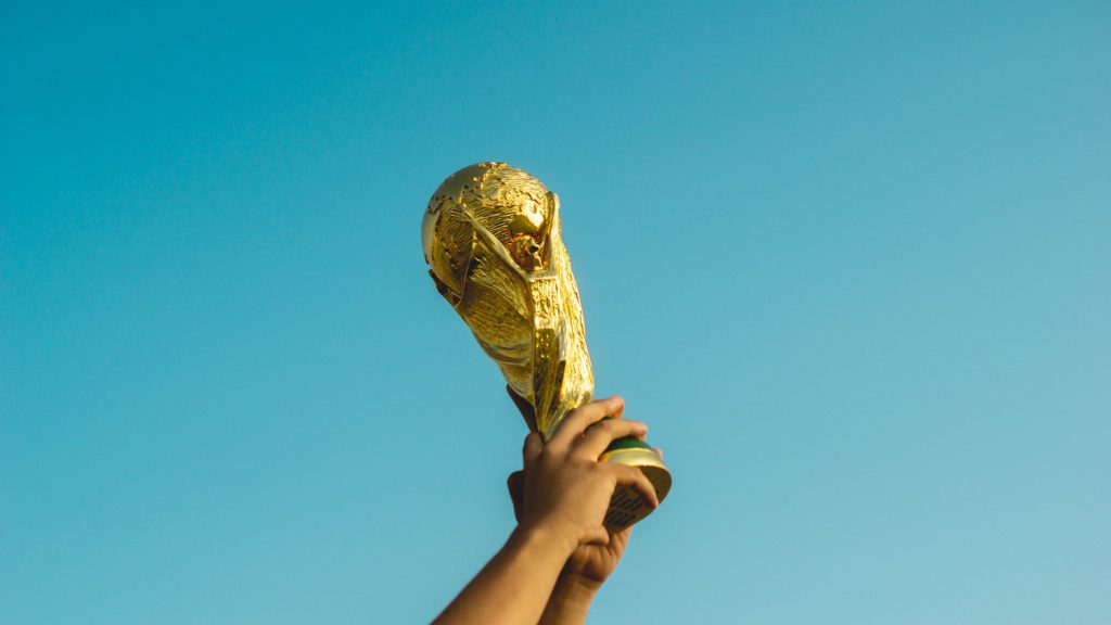 decorative image: trophy against blue sky